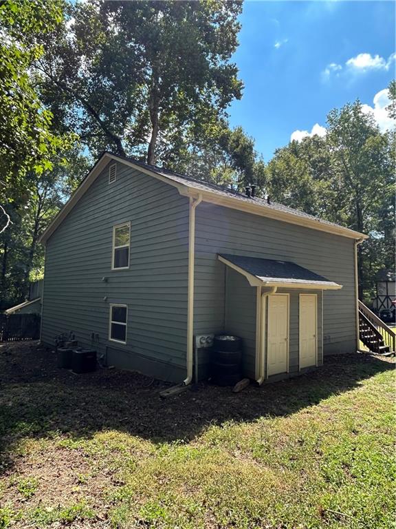 1230 Hanover Place Alpharetta, GA 30009 - Photo 25 of 29 a view of a house with a yard
