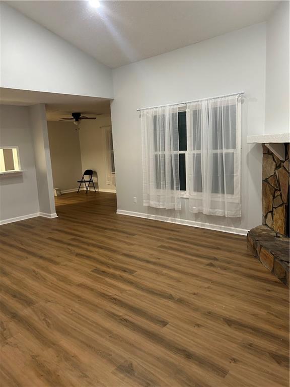 1230 Hanover Place Alpharetta, GA 30009 - Photo 6 of 29 an empty room with wooden floor and furniture