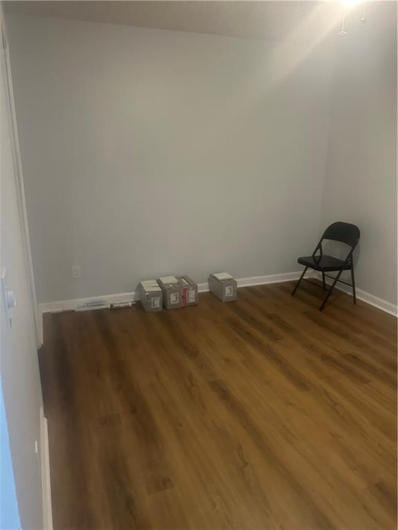 1230 Hanover Place Alpharetta, GA 30009 - Photo 10 of 29 a view of wooden floor and table in a room