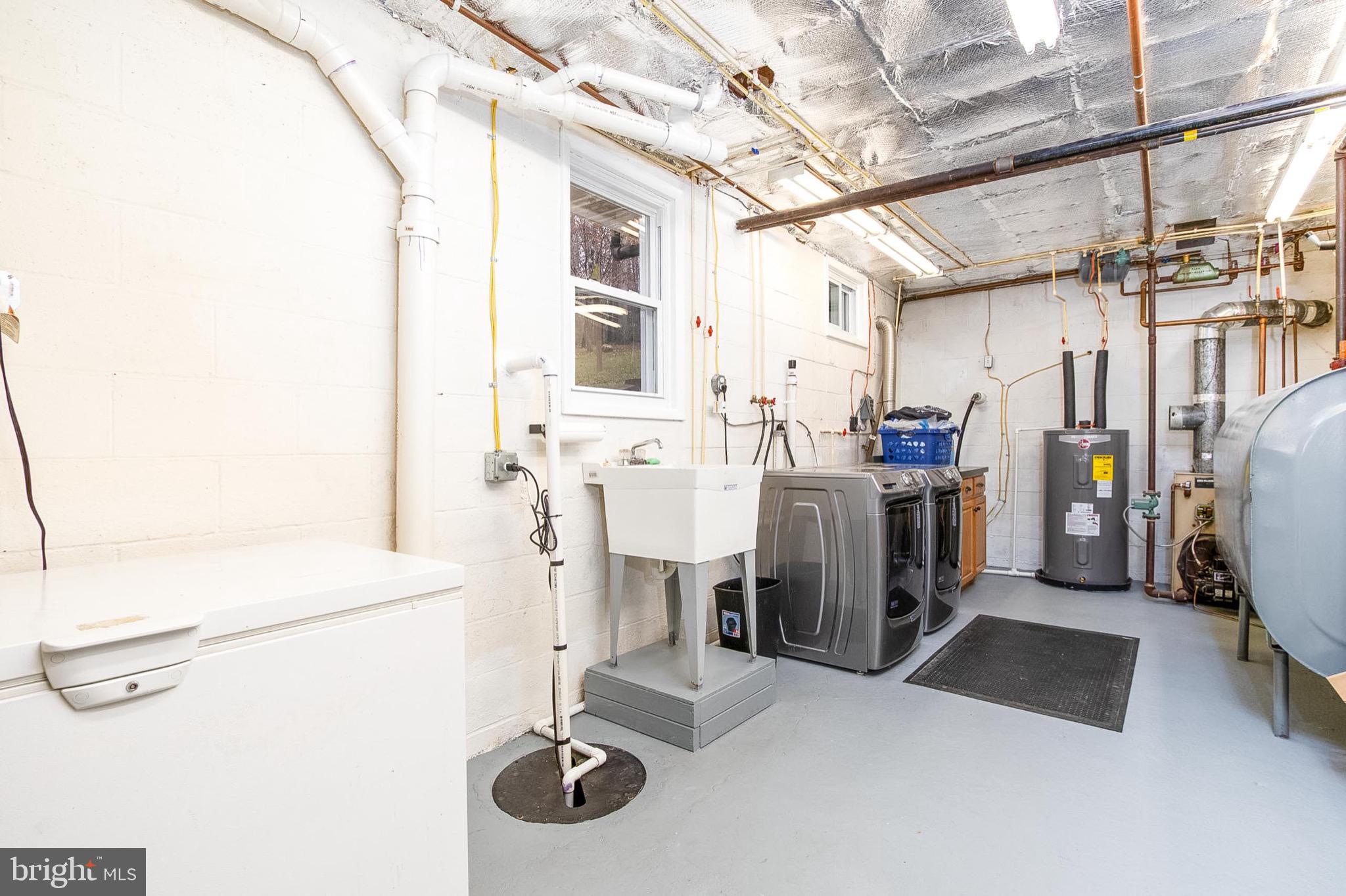 355 Silver Run Valley Road Westminster, MD 21158 - Photo 24 of 49 a view of a storage & utility room with racks