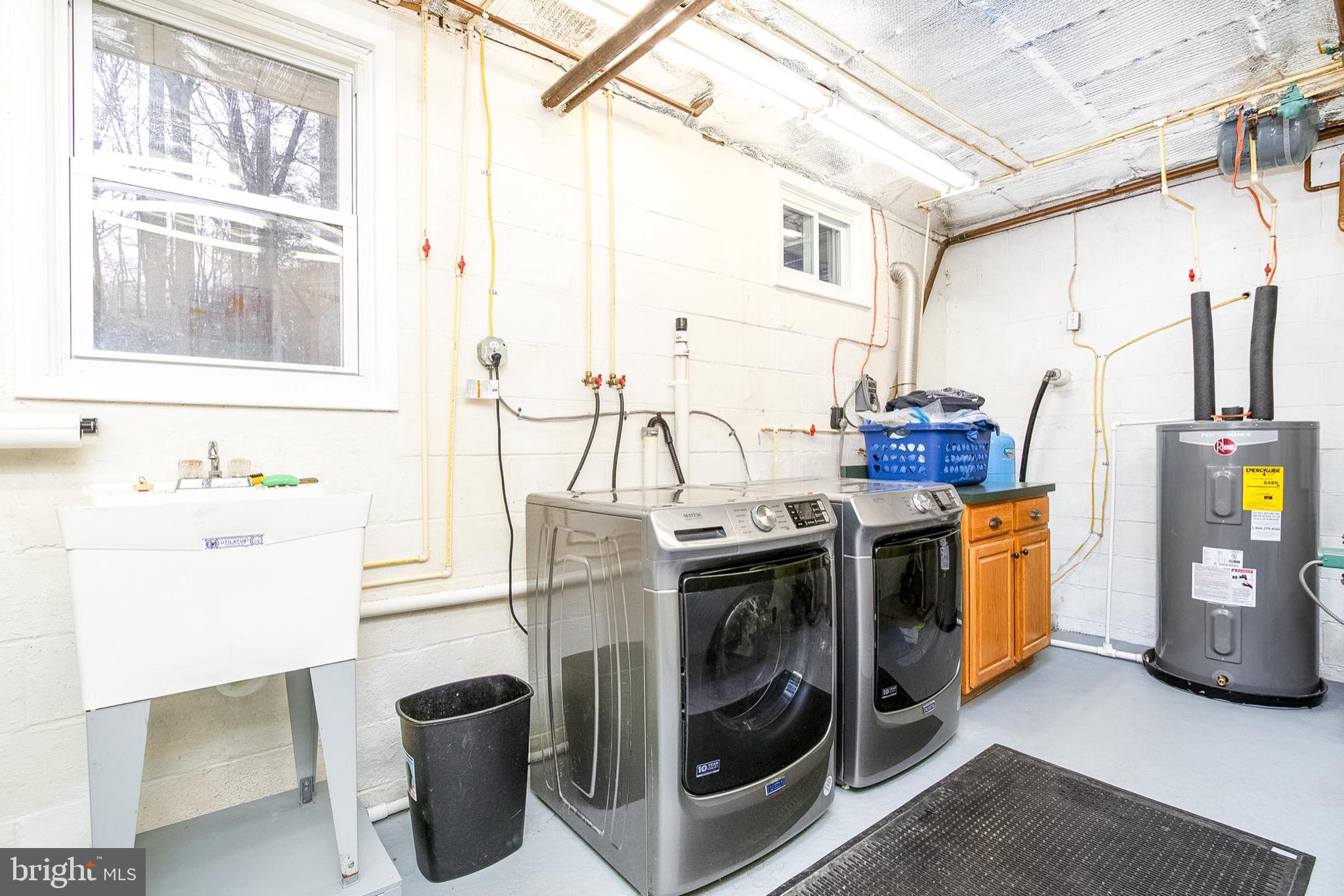 355 Silver Run Valley Road Westminster, MD 21158 - Photo 25 of 49 a utility room with dryer and washer