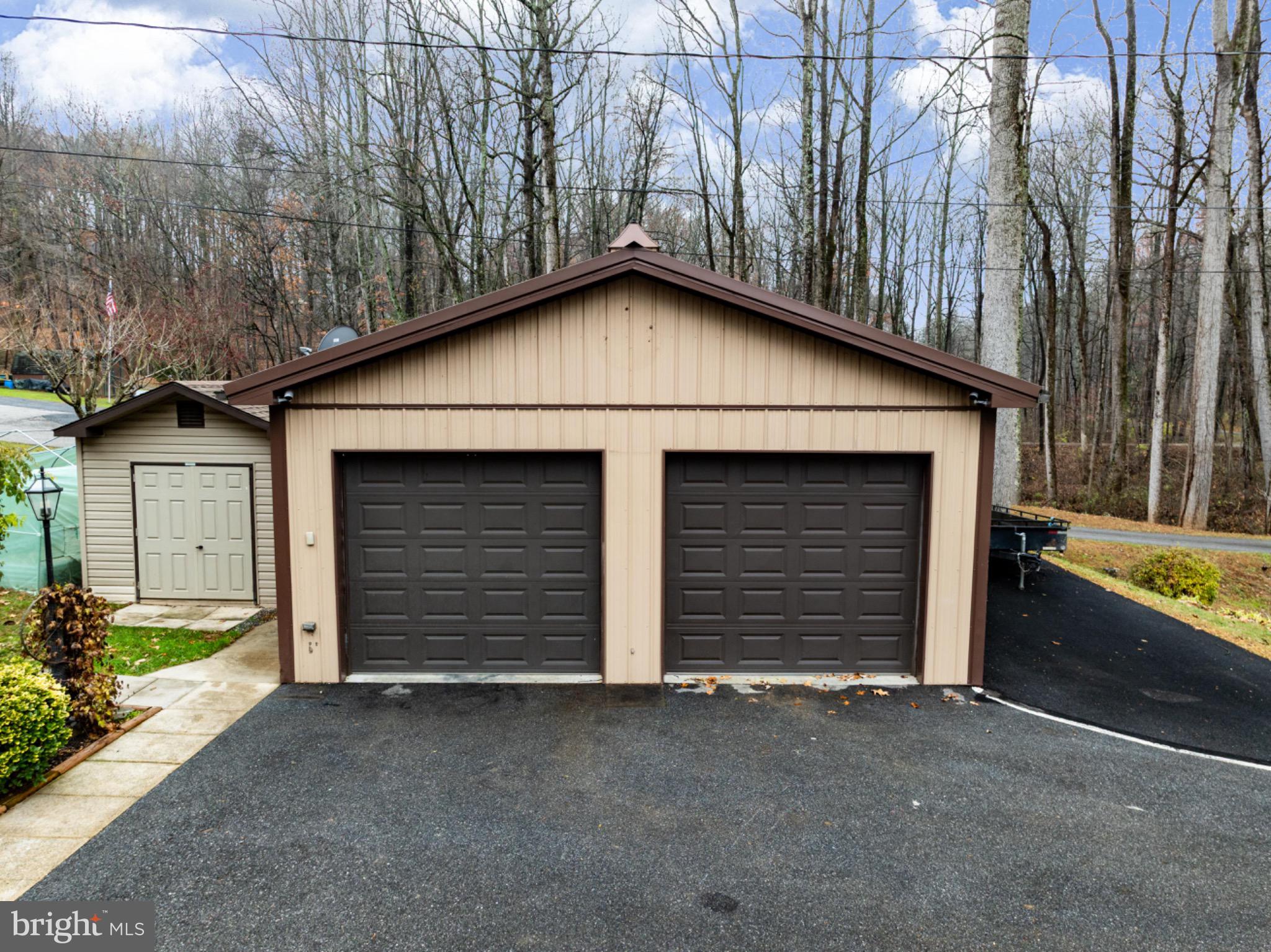 355 Silver Run Valley Road Westminster, MD 21158 - Photo 38 of 49 a house with yard and garage