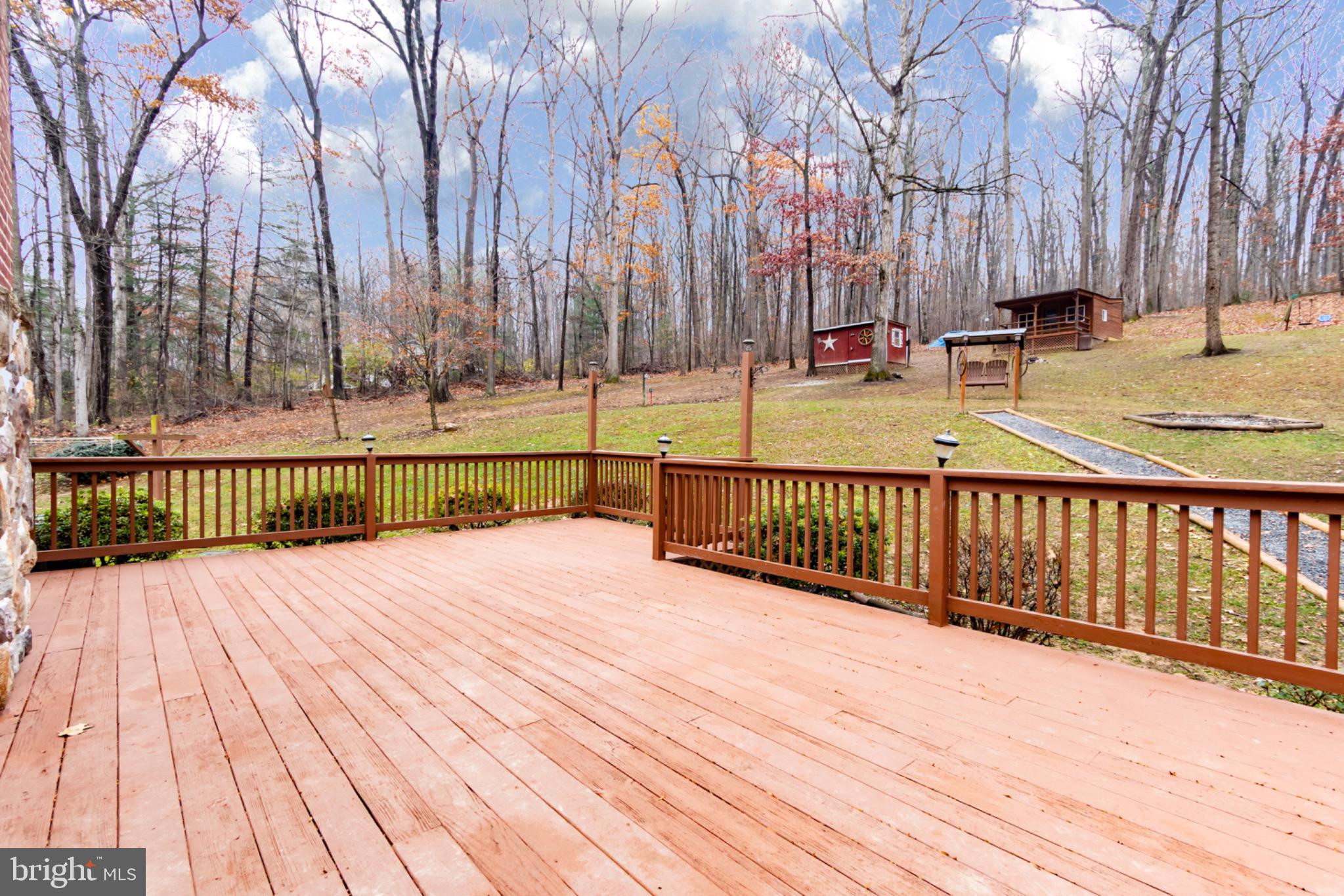 355 Silver Run Valley Road Westminster, MD 21158 - Photo 40 of 49 a view of a deck with a yard