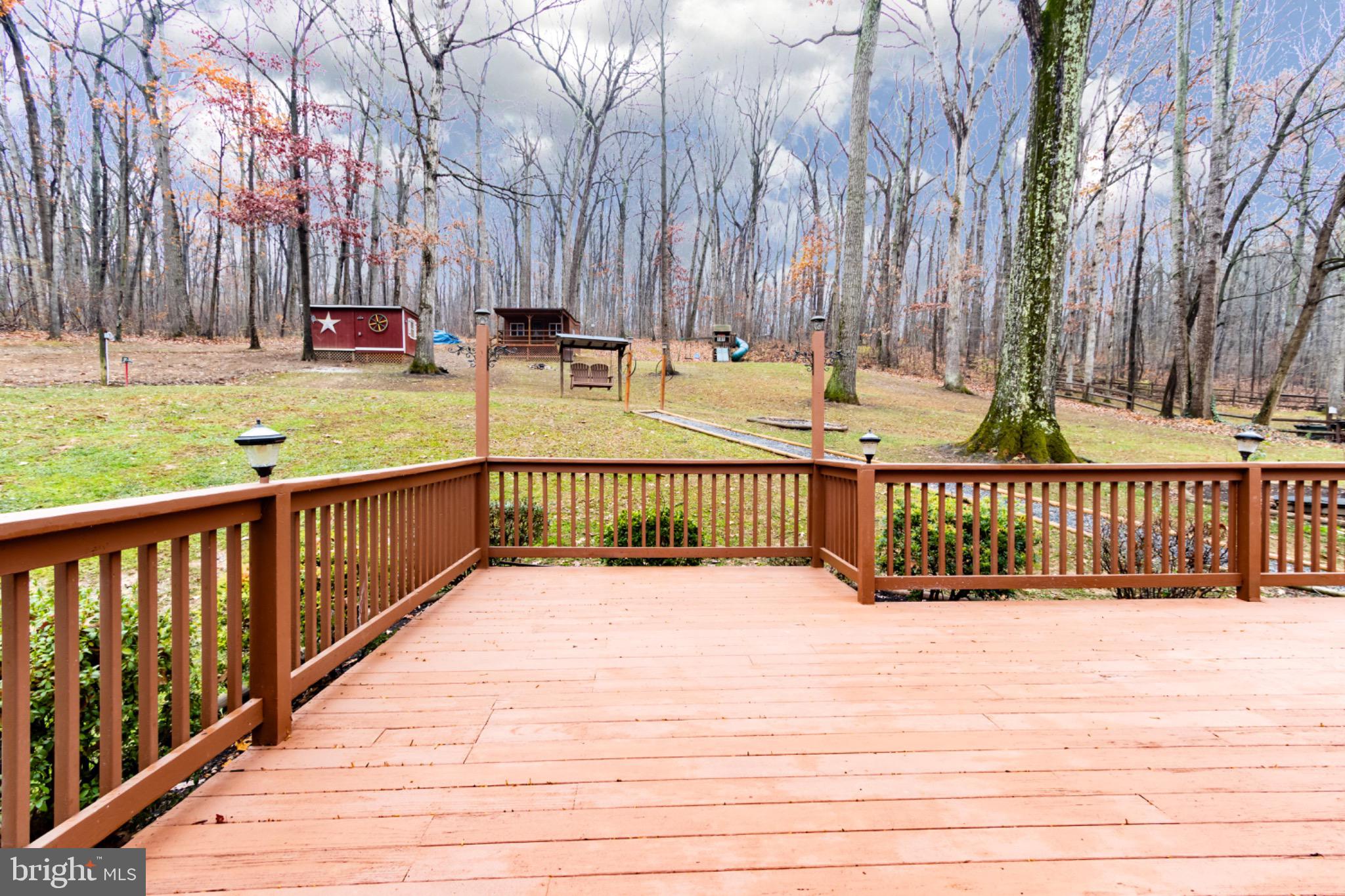 355 Silver Run Valley Road Westminster, MD 21158 - Photo 41 of 49 a view of a deck with a yard
