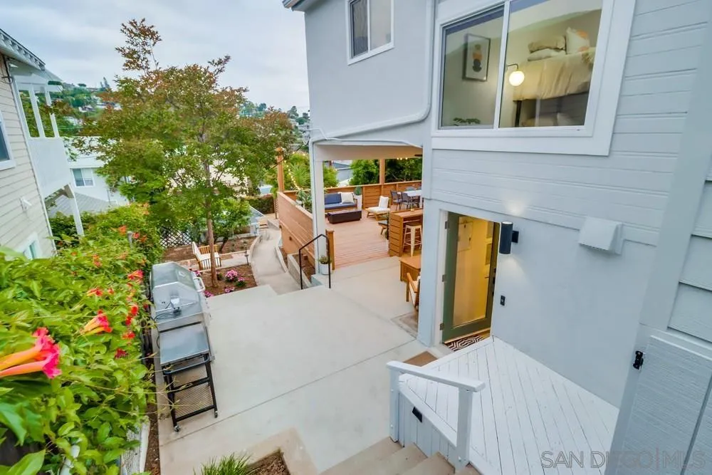 4584 3rd Street La Mesa, CA 91941 - Photo 19 of 57 a view of a house with backyard and sitting area