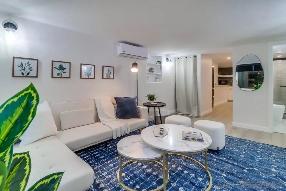 4584 3rd Street La Mesa, CA 91941 - Photo 26 of 57 a living room with furniture and a rug