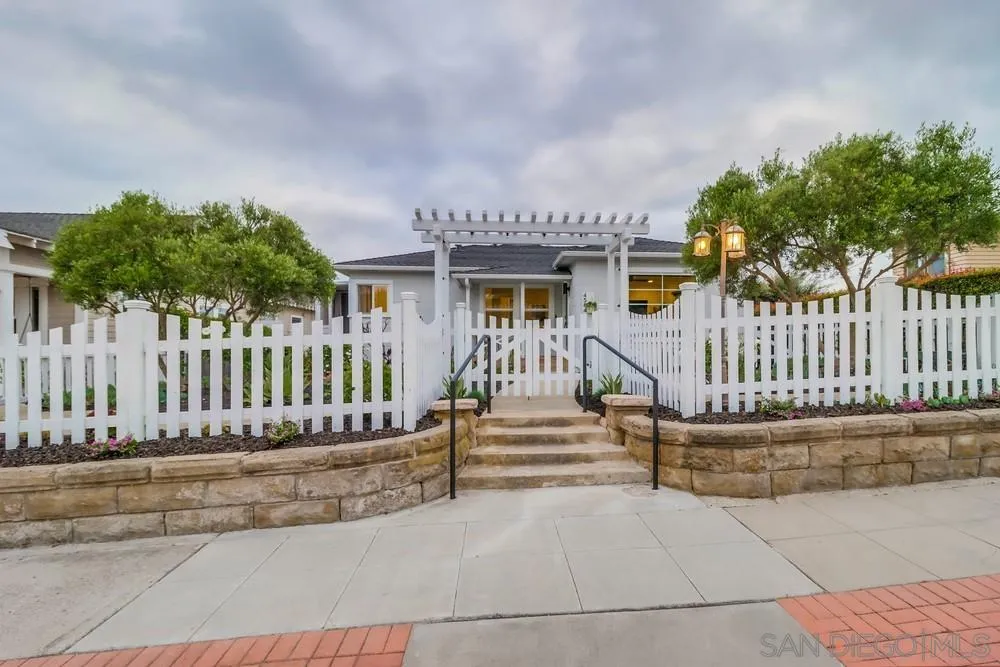 4584 3rd Street La Mesa, CA 91941 - Photo 3 of 57 a view of a house with wooden fence and a porch