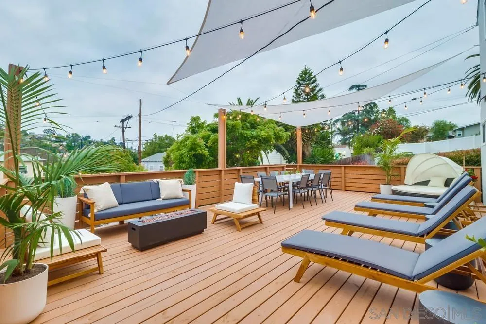 4584 3rd Street La Mesa, CA 91941 - Photo 34 of 57 a view of a patio with couches wooden floor and outdoor seating