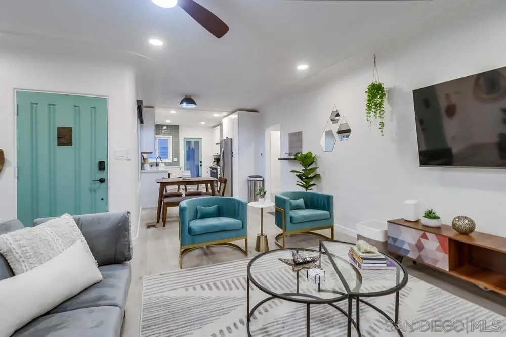 4584 3rd Street La Mesa, CA 91941 - Photo 4 of 57 a living room with furniture and a flat screen tv