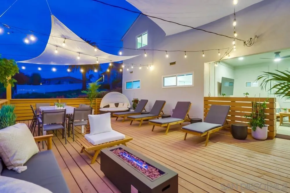 4584 3rd Street La Mesa, CA 91941 - Photo 57 of 57 a living room with lots of furniture and view of kitchen
