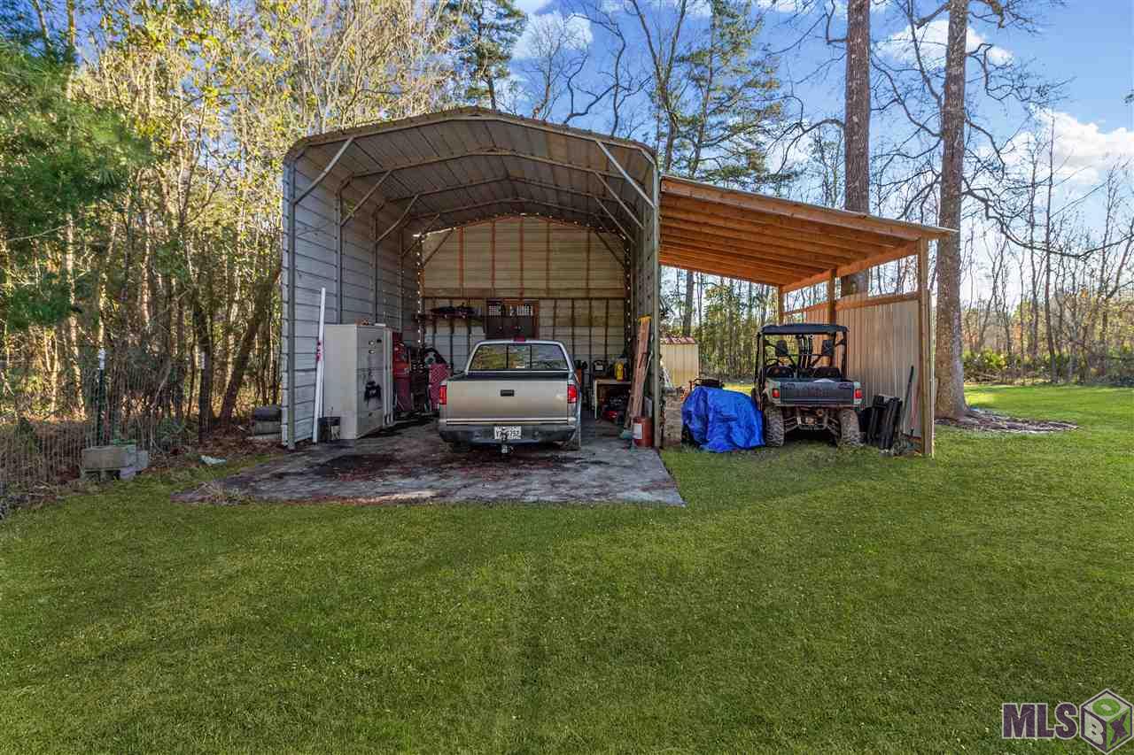 21362 Dewitt May Road Livingston, LA 70754 - Photo 3 of 21 STORAGE/SHOP AREA IN REAR LEFT YARD