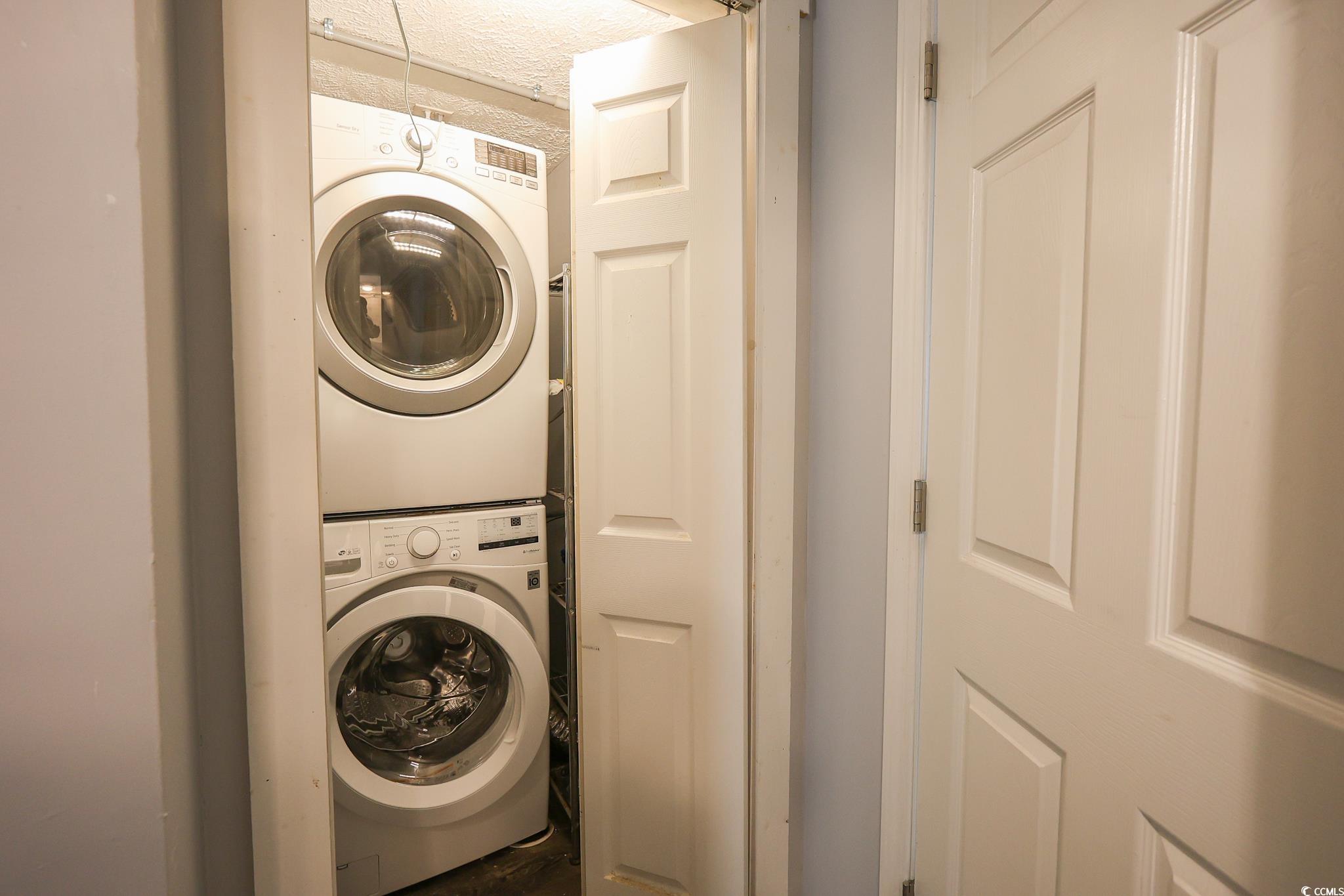 1841 Jasper Street Georgetown, SC 29440 - Photo 23 of 33 Washroom featuring stacked washer and dryer