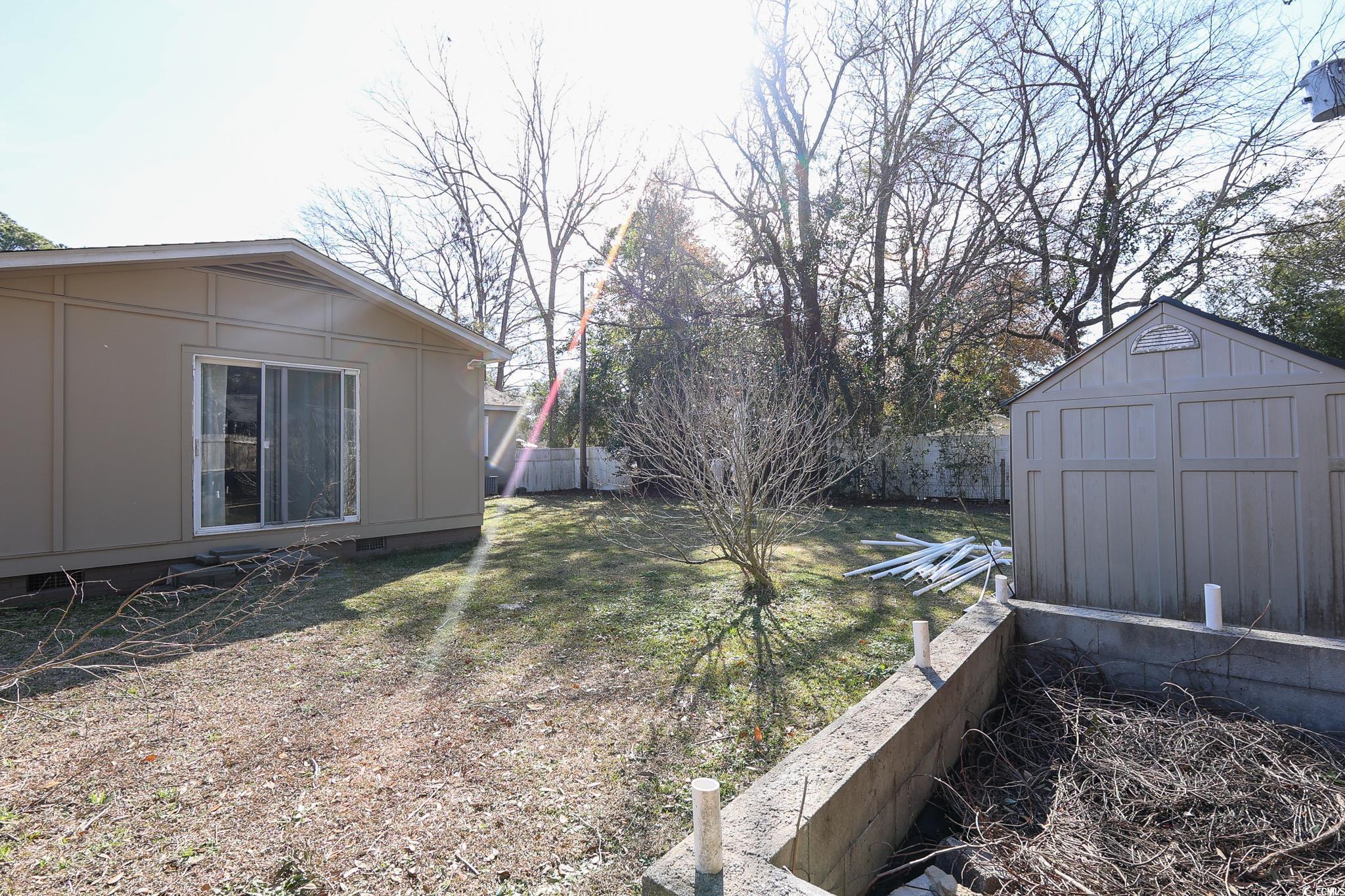 1841 Jasper Street Georgetown, SC 29440 - Photo 28 of 33 View of yard with a storage unit