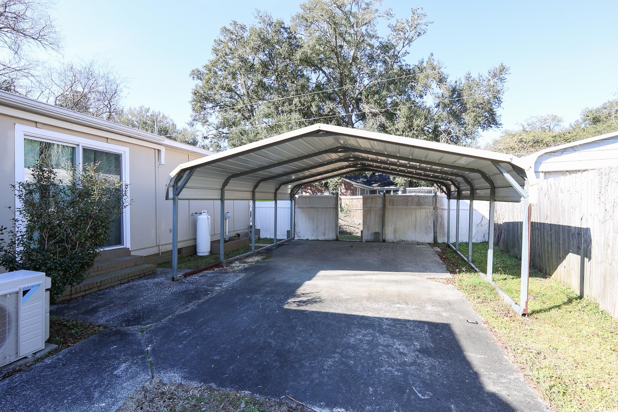 1841 Jasper Street Georgetown, SC 29440 - Photo 31 of 33 View of parking with a carport