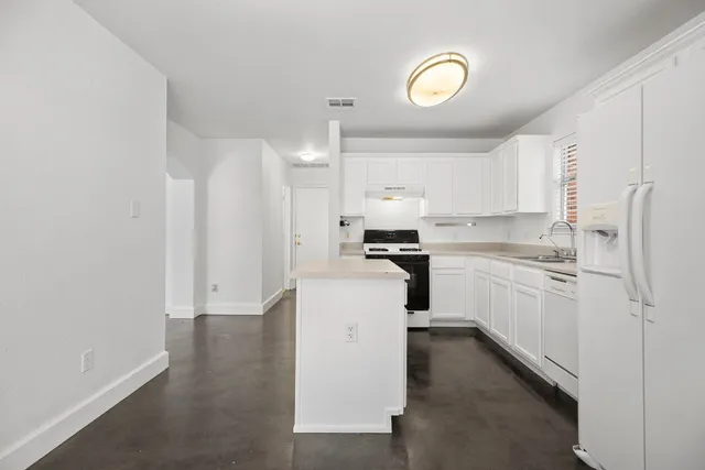 a view of a room with racks on the wall