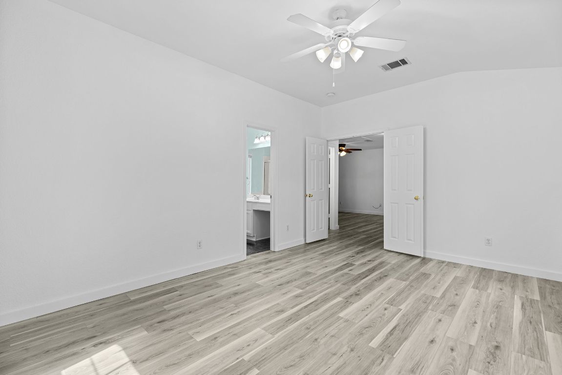 1886 Wallin Loop Round Rock, TX 78664 - Photo 22 of 28 wooden floor in an empty room