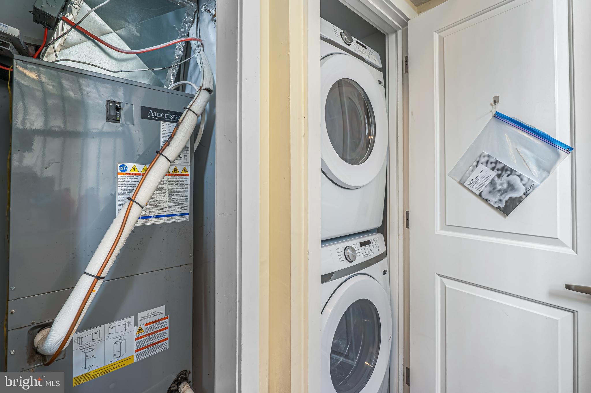 1724 Monument Street, Unit B Philadelphia, PA 19121 - Photo 22 of 26 a view of entryway with washer and dryer