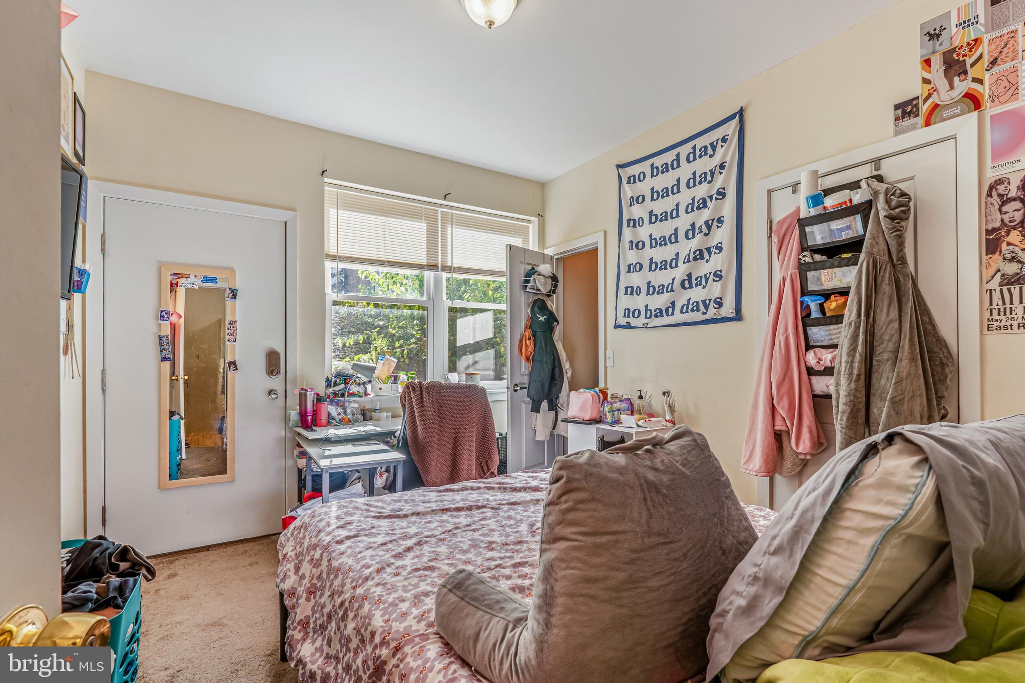 1724 Monument Street, Unit B Philadelphia, PA 19121 - Photo 9 of 26 a bedroom with a bed and a window