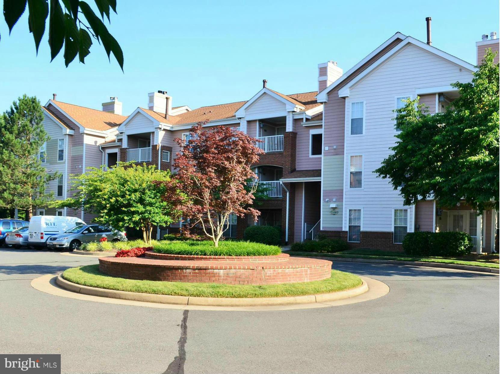 20977 Timber Ridge Terrace, Unit 103 Ashburn, VA 20147 - Photo 1 of 12 Exterior (Front)