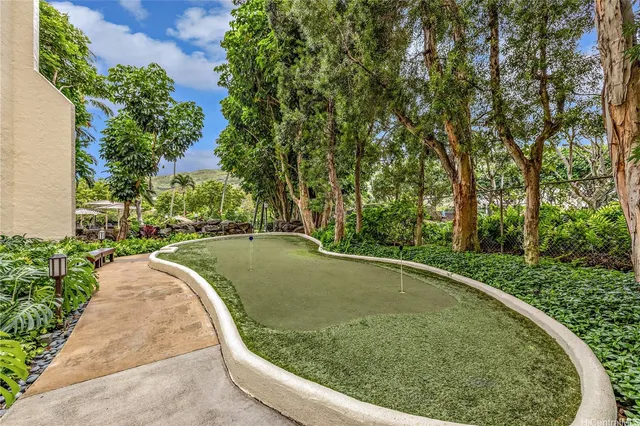 a view of a swimming pool from a outdoor space