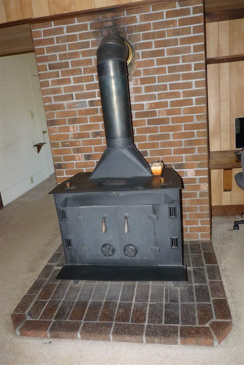 3836 Old Beulah Road Selma, NC 27576 - Photo 7 of 25 Wood Burning Stove