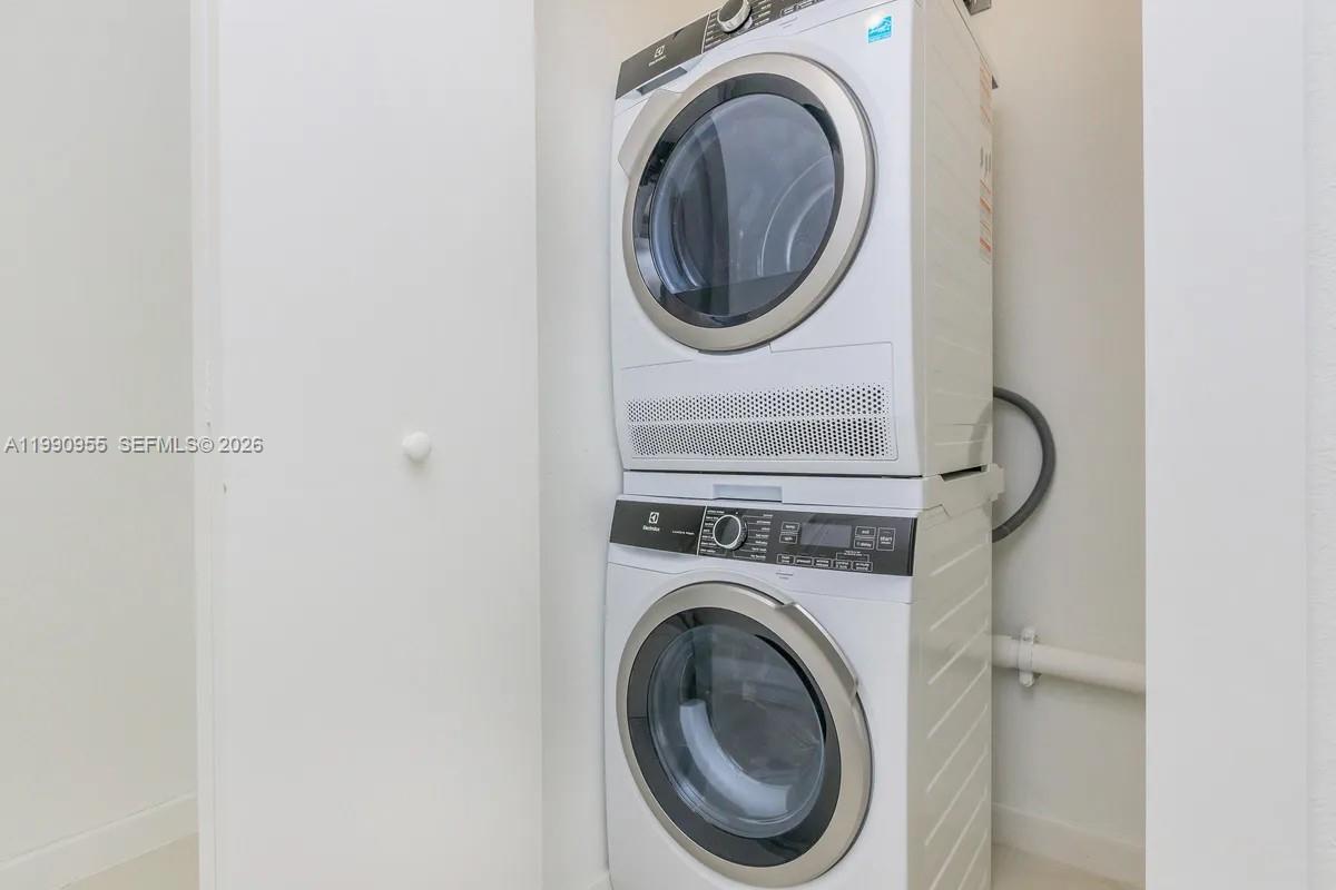 25850 Southwest 140th Court, Unit 6312 Homestead, FL 33032 - Photo 12 of 24 a utility room with dryer and washer