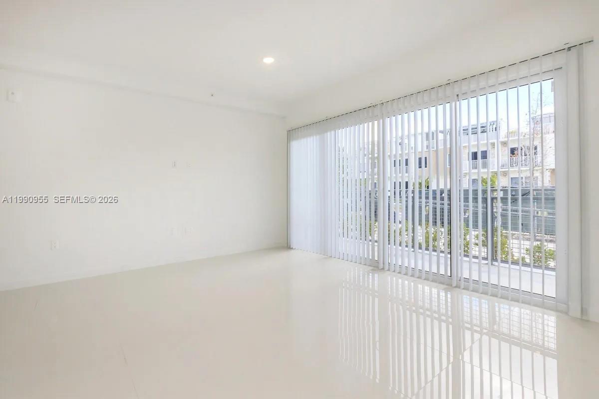 25850 Southwest 140th Court, Unit 6312 Homestead, FL 33032 - Photo 3 of 24 a view of a room with a large window