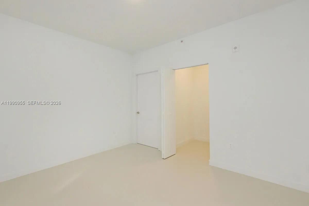 25850 Southwest 140th Court, Unit 6312 Homestead, FL 33032 - Photo 8 of 24 a view of an empty room