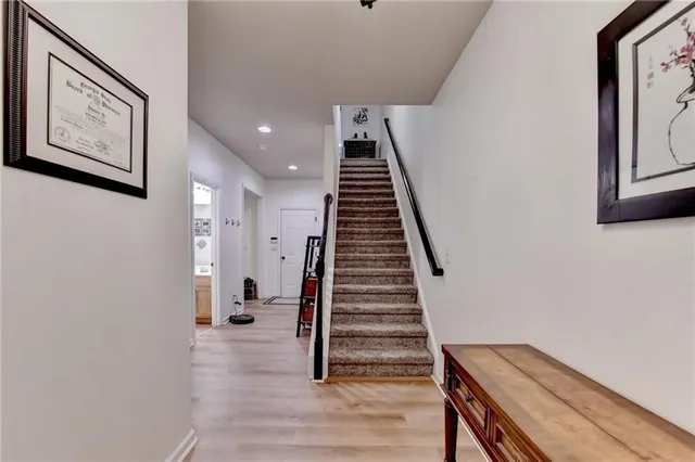 a view of a hallway with staircase