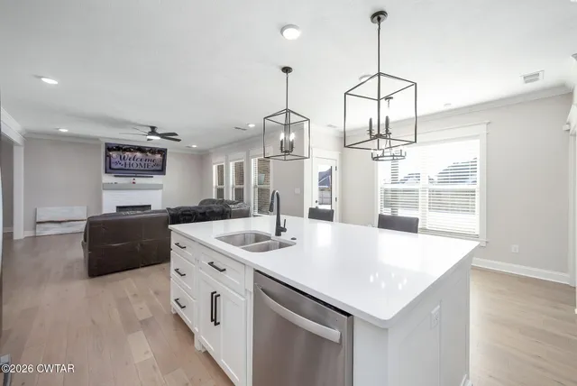 a very nice looking dining room with a table and chairs