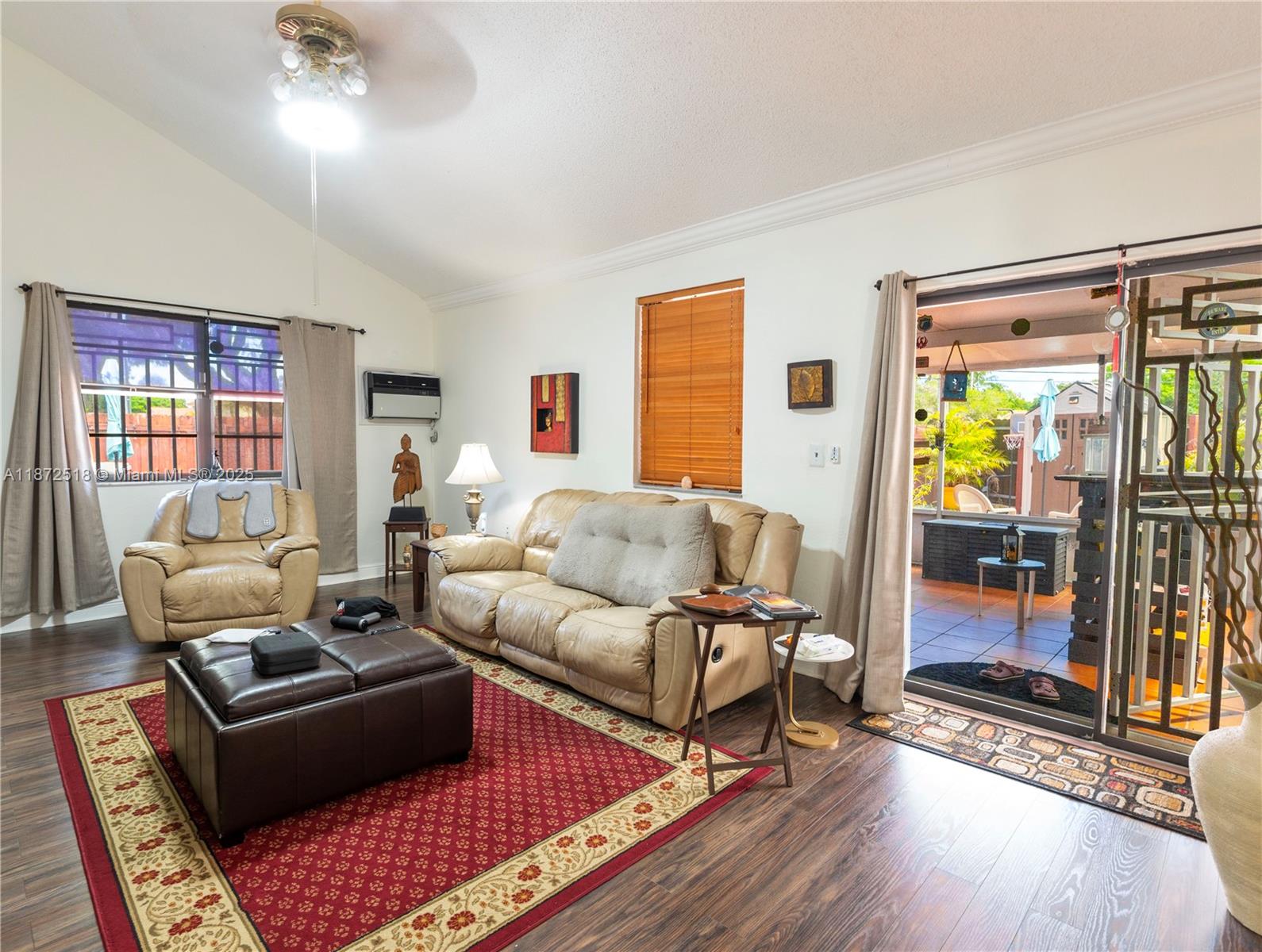 15275 Southwest 56th Terrace Miami, FL 33193 - Photo 11 of 32 a living room with furniture and a window