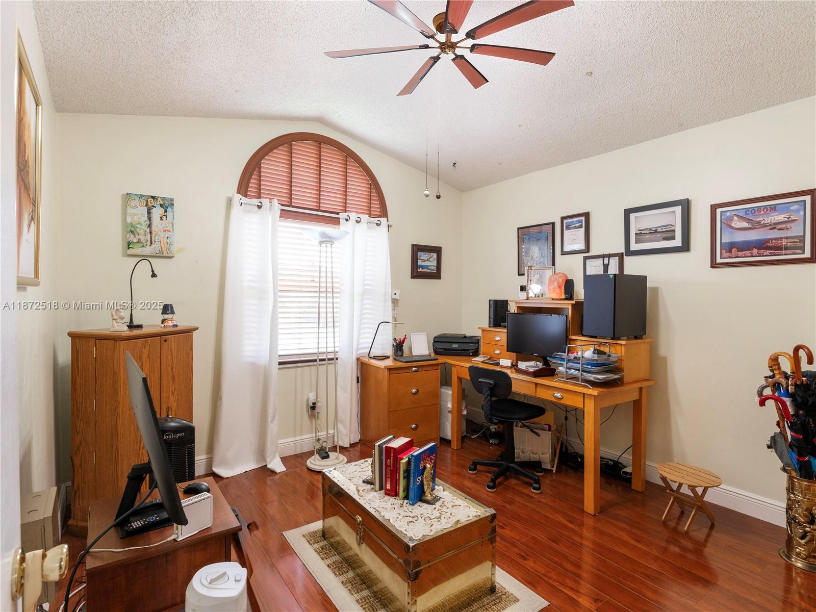 15275 Southwest 56th Terrace Miami, FL 33193 - Photo 12 of 32 a view of a workspace with furniture and a workspace
