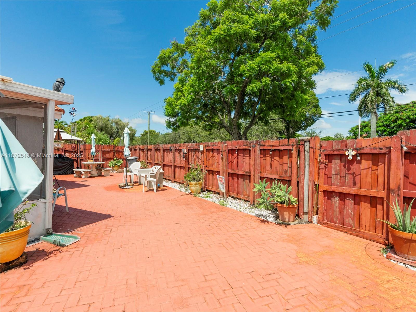 15275 Southwest 56th Terrace Miami, FL 33193 - Photo 20 of 32 an outdoor space with patio
