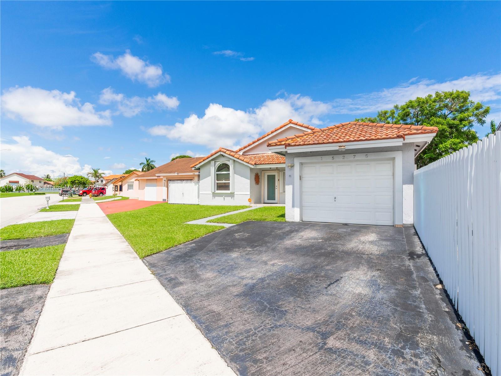 15275 Southwest 56th Terrace Miami, FL 33193 - Photo 28 of 32 a view of outdoor space yard and garage