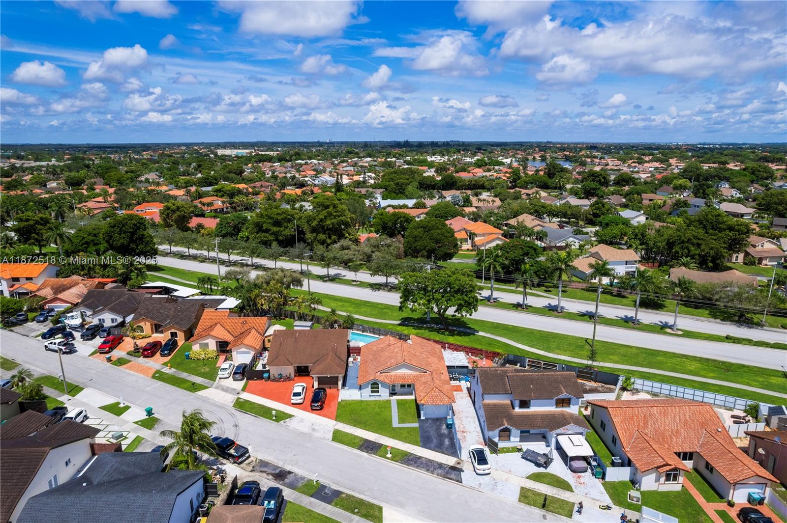 15275 Southwest 56th Terrace Miami, FL 33193 - Photo 29 of 32 an aerial view of a houses with a garden