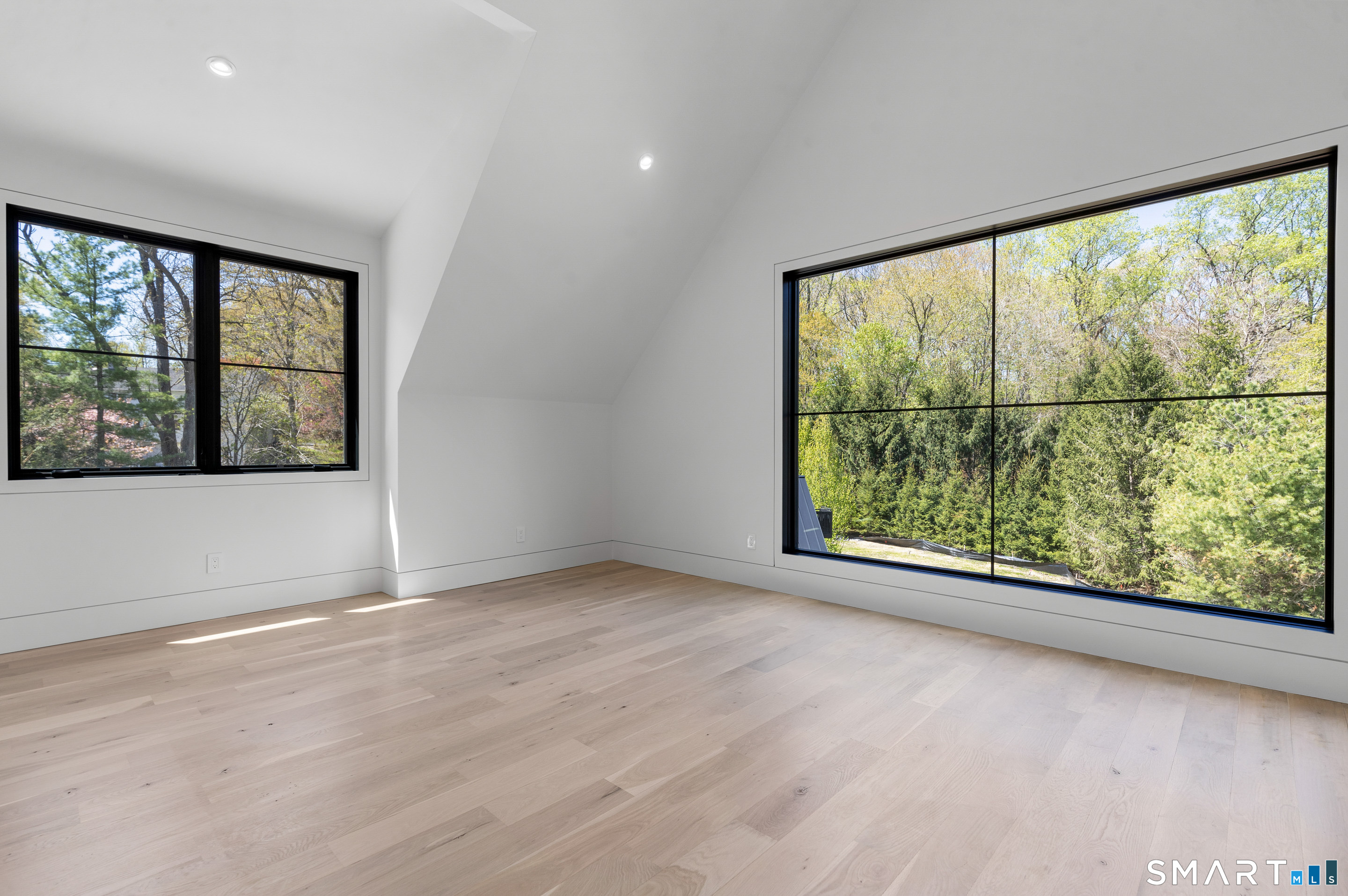 259 Frogtown Road New Canaan, CT 06840 - Photo 31 of 39 This can be one of your bedroom views. Custom windows that embrace Mother Nature, the pond, and the breathtaking views