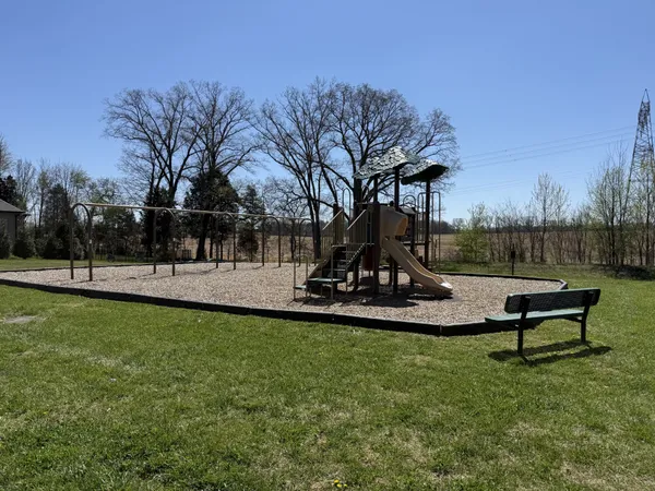 a view of a park with bench