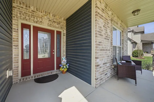 a view of backyard with furniture