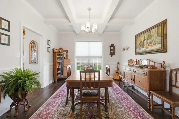 a view of a livingroom with furniture window and wooden floor