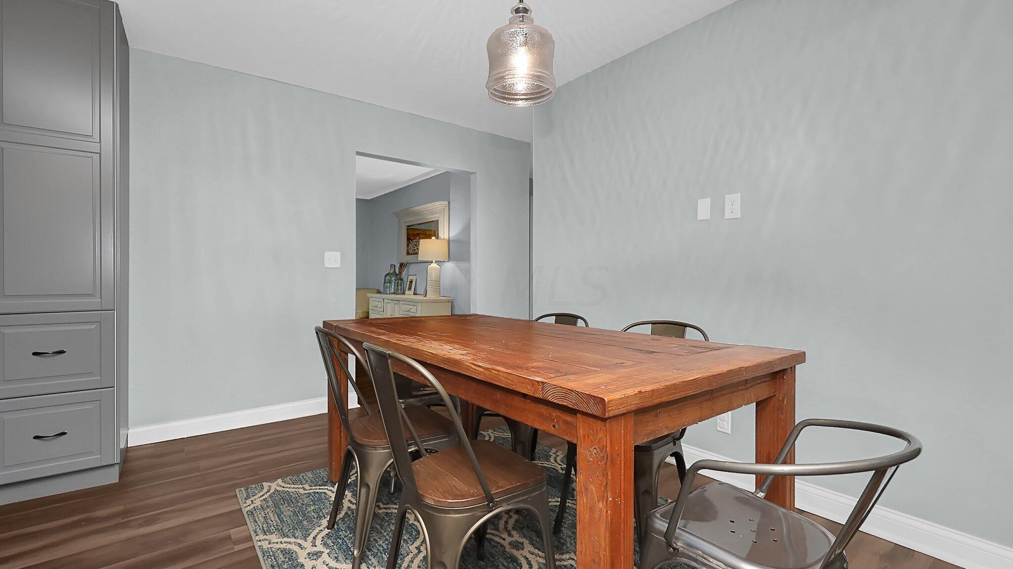 7790 Schott Road Westerville, OH 43081 - Photo 9 of 50 Directly off of the dining room you'll find an eat-in kitchen space with upgraded lighting and easy access to the FULLY updated kitchen!