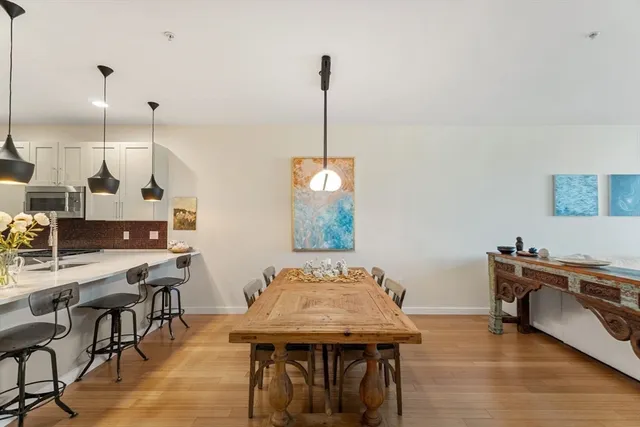 a view of a dining room with furniture