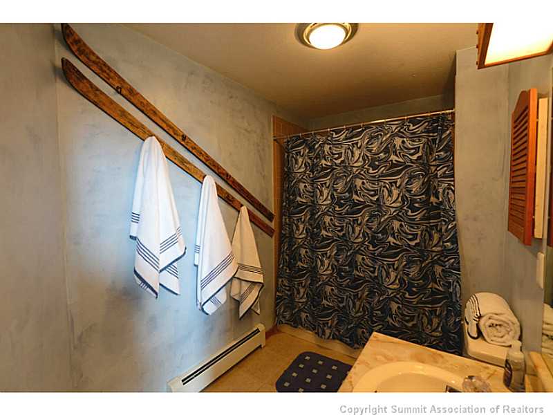 9460 Ryan Gulch Road, Unit 82 Silverthorne, CO 80498 - Photo 23 of 25 Bathroom. Loft guest bath.