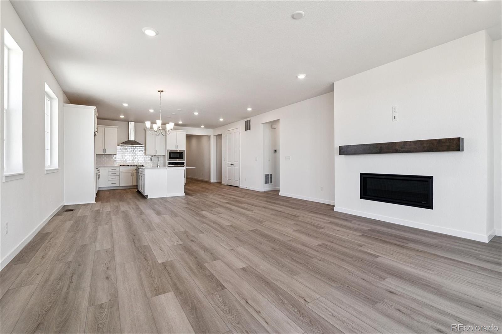 741 Lawson Drive Elizabeth, CO 80107 - Photo 14 of 27 a view of kitchen with sink and wooden floor