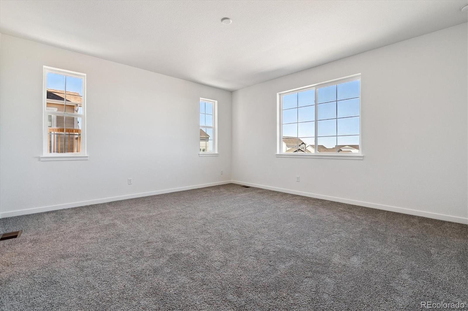 741 Lawson Drive Elizabeth, CO 80107 - Photo 17 of 27 an empty room with a window