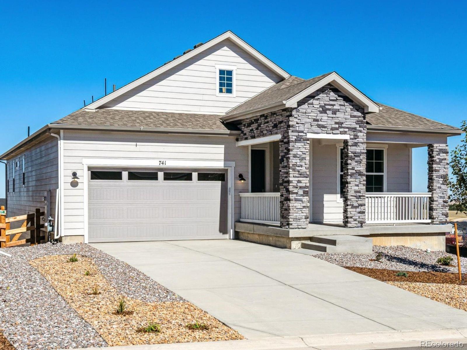 741 Lawson Drive Elizabeth, CO 80107 - Photo 2 of 27 a front view of a house with a yard