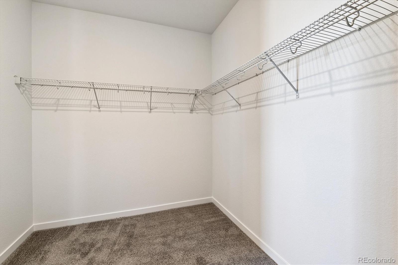 741 Lawson Drive Elizabeth, CO 80107 - Photo 21 of 27 a view of a room with racks on the wall