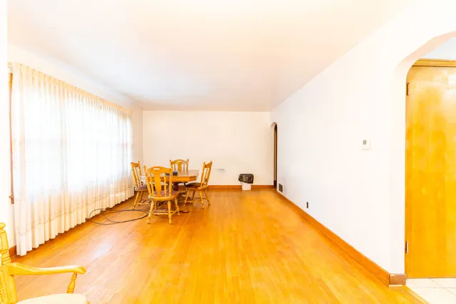 a view of a swimming pool with an outdoor seating