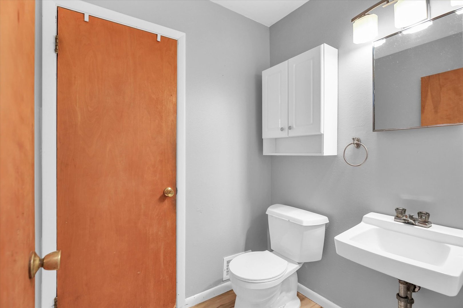 2107 Barberry Drive Champaign, IL 61821 - Photo 19 of 37 a white toilet sitting next to a bathroom sink