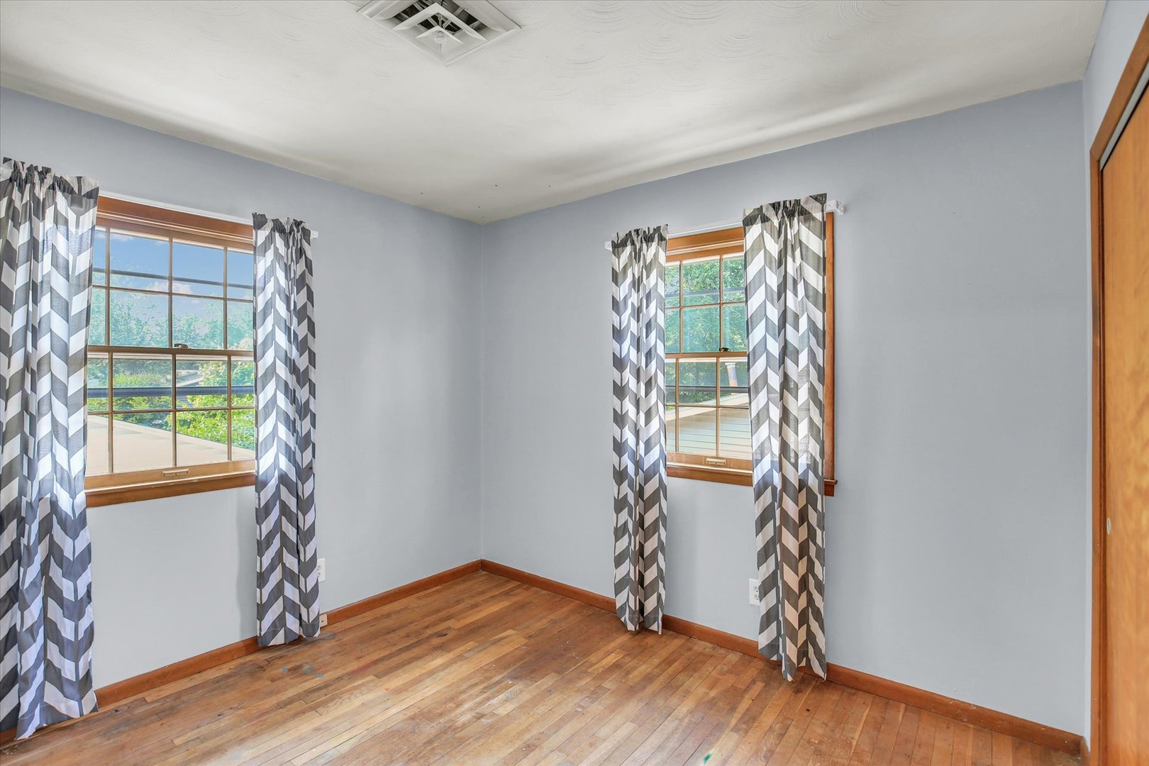 2107 Barberry Drive Champaign, IL 61821 - Photo 23 of 37 a view of empty room with window and wooden floor