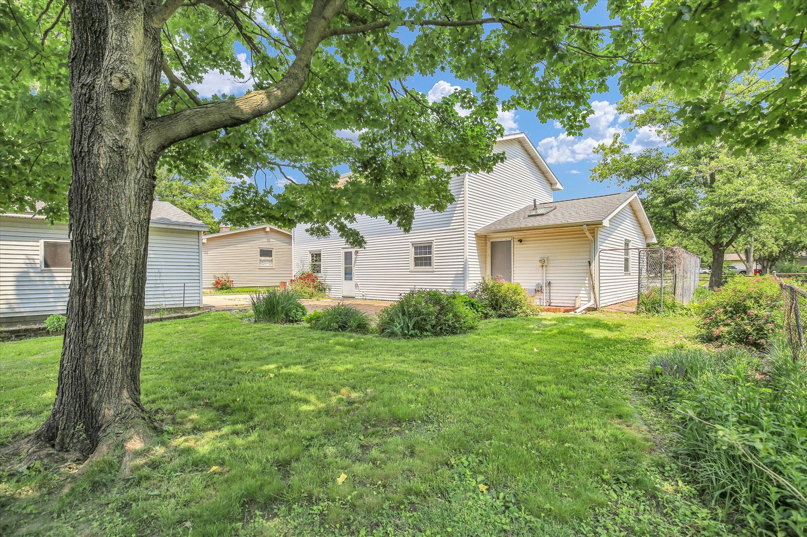 2107 Barberry Drive Champaign, IL 61821 - Photo 30 of 37 a front view of house with yard and green space